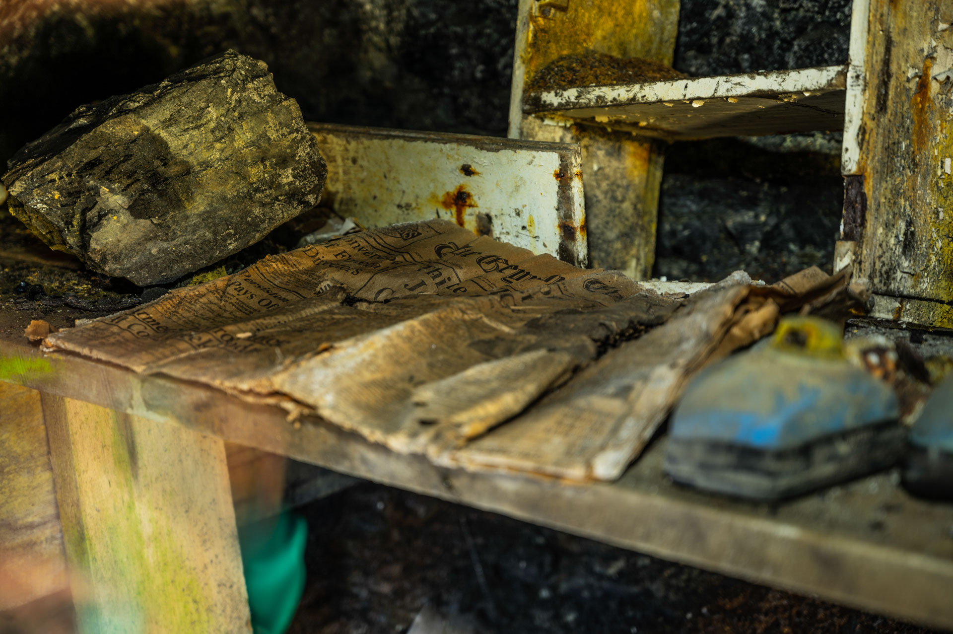Inside a mineshaft with preserved 1993 newspaper