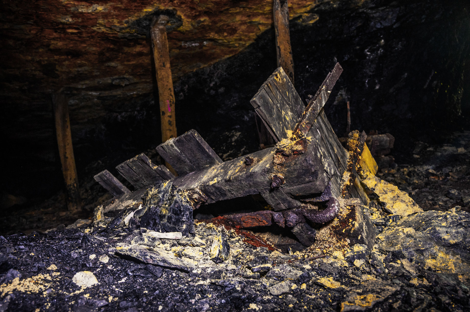 Mine cart ruins inside a mine