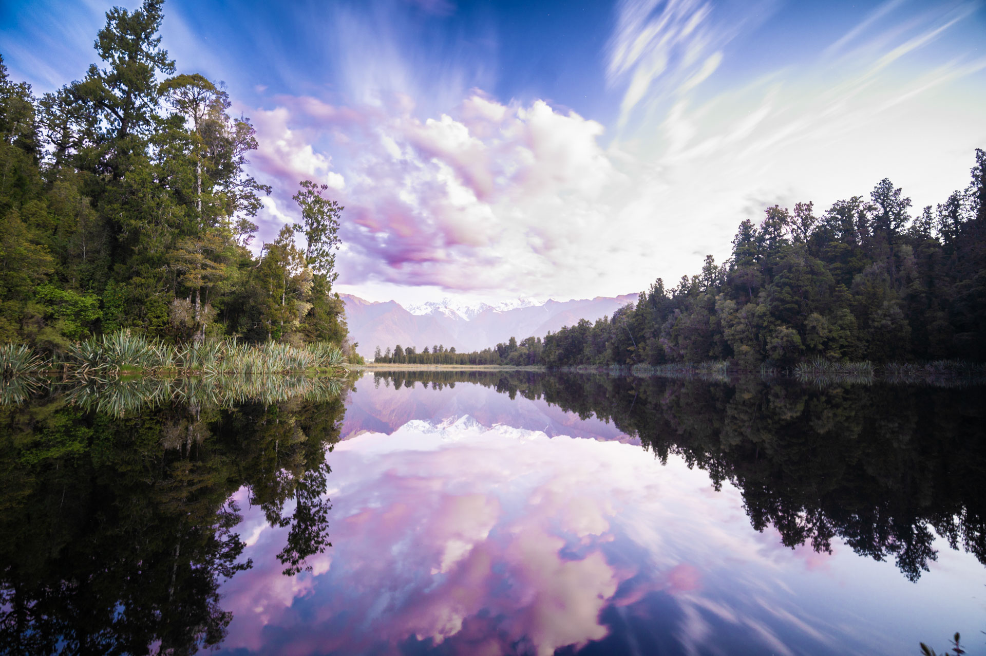 Lake Matheson after sunset with stars
