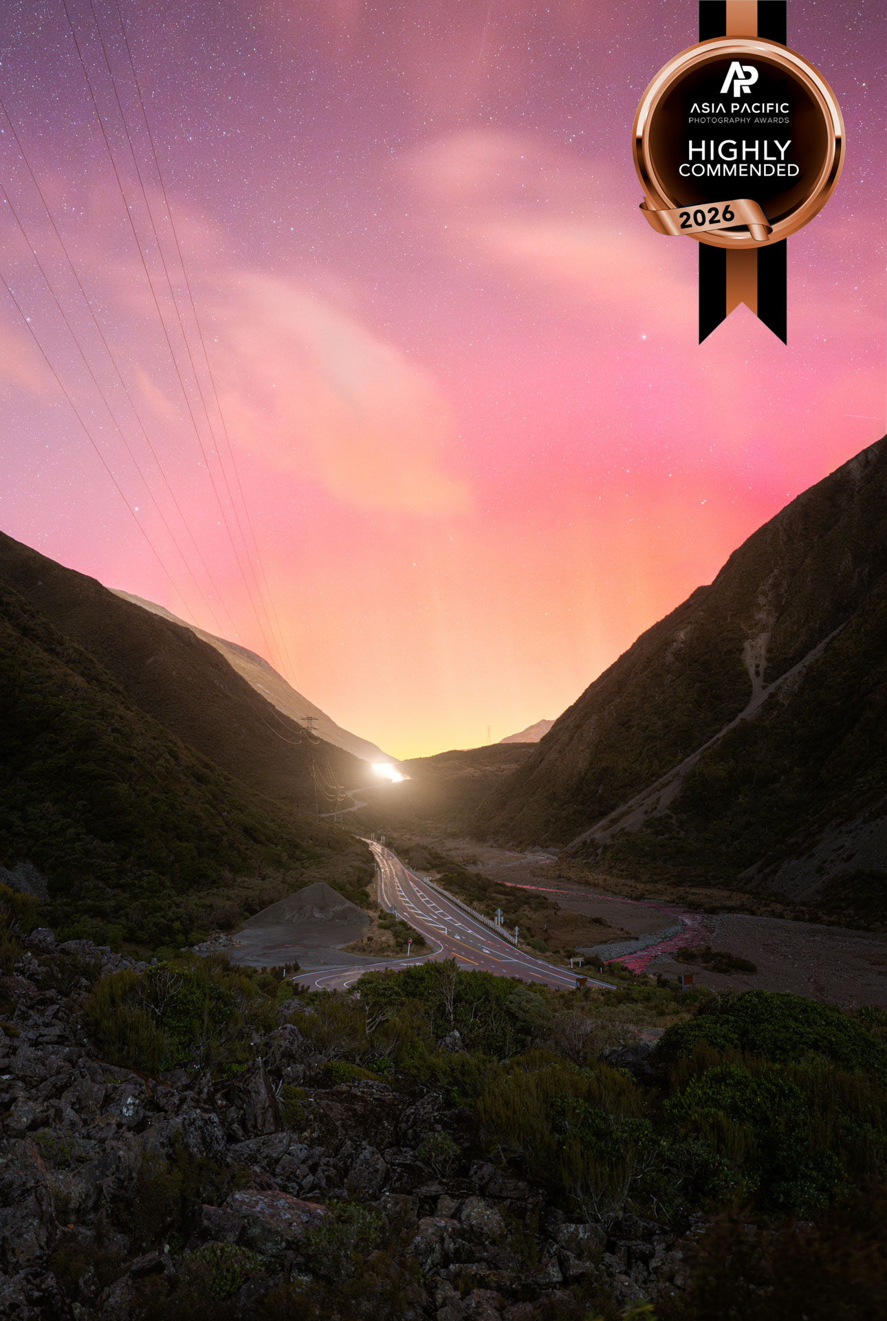 Asia Pacific 2026 aurora through mountains near Otira